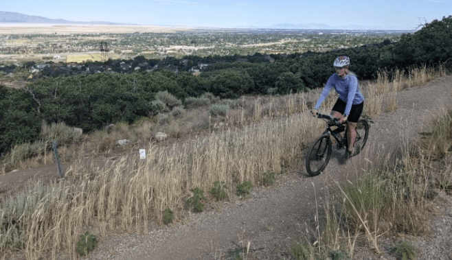 Mountain biker on a trail at The Farm in Farmington, Utah